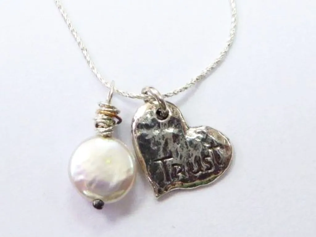 Elegant Sterling Silver Necklace with Heart-Shaped Pearl Pendant