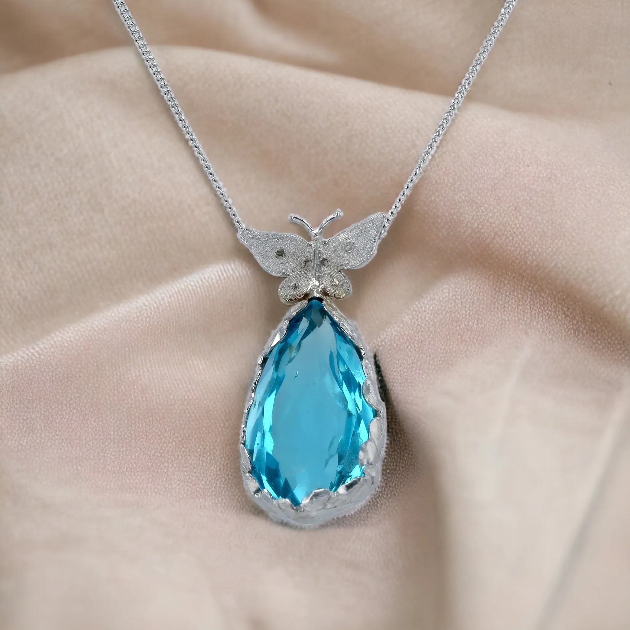 White 14K gold pear blue topaz Cz butterfly necklace